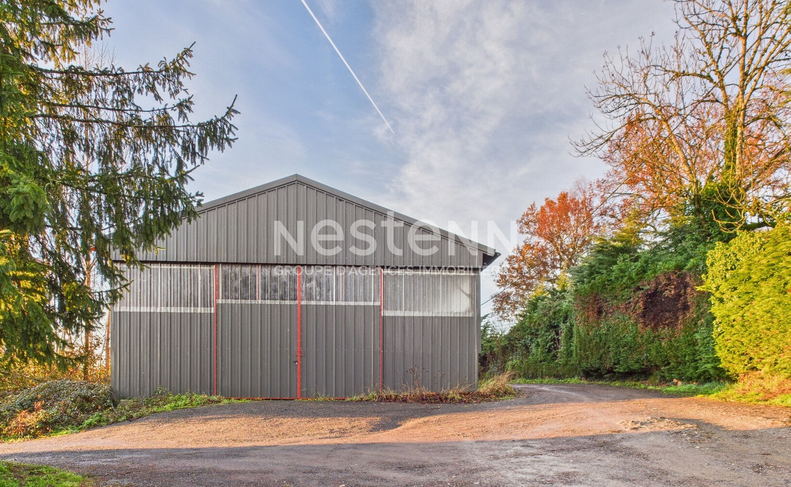 A Aurillac, quartier Belbex, à Vendre grange-entrepôt d'une surface de 280 m²