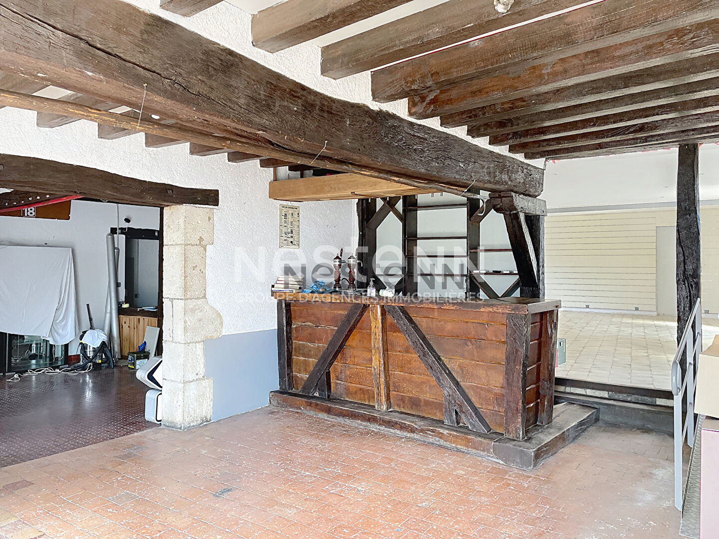 Photo Découvrez cette maison pleine de charme à vendre avec 3 grandes pièces, appartement indépendant à l'étage, greniers aménageables et dépendances. Idéal pour commerce, projet locatif ou maison familiale. image 6/6