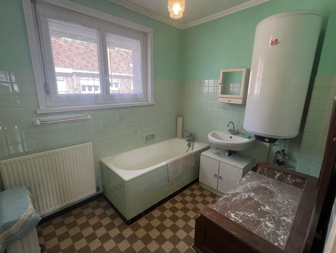 Maison Sequedin 90 m² - trois chambres - une cour - dépendance - véranda - combles aménageables