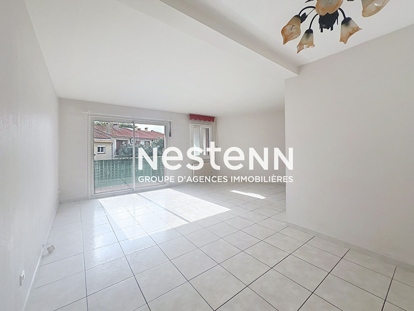 Photo À vendre : Appartement spacieux de 4 pièces à Perpignan, secteur Kennedy, balcons et place de parking. image 2/6