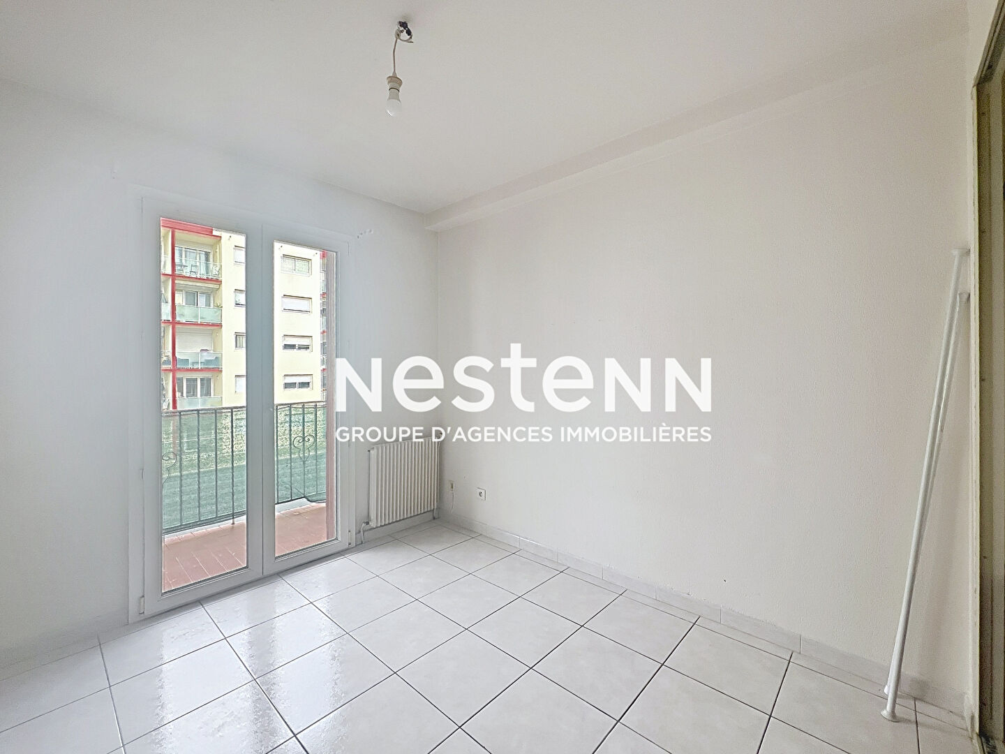 Photo À vendre : Appartement spacieux de 4 pièces à Perpignan, secteur Kennedy, balcons et place de parking. image 6/6