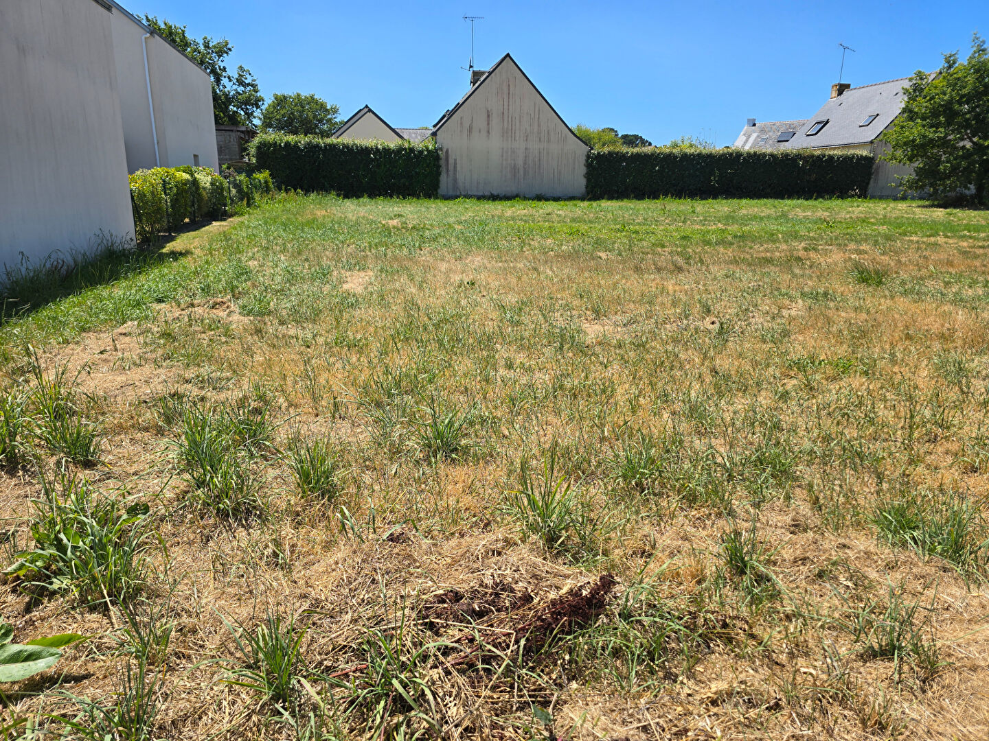 Photo SAINT MOLF - Dans le bourg, terrain viabilisé image 2/2