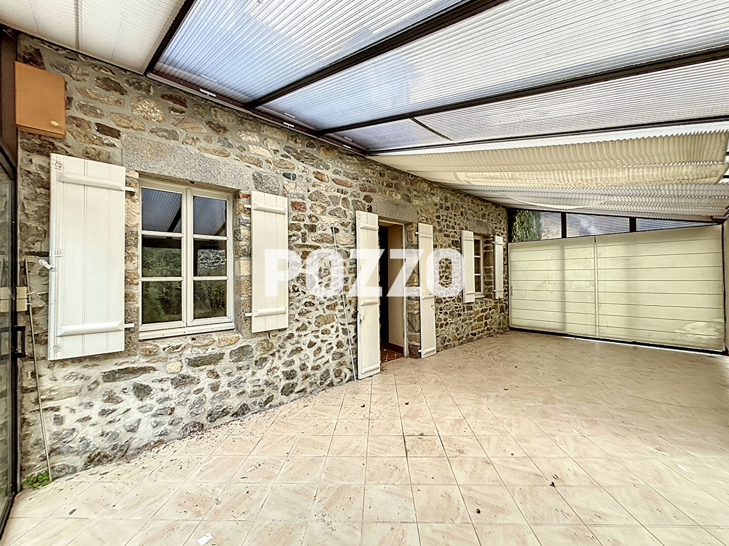 Photo Blainville Sur Mer, 2.5 kms de la mer,  jolie maison en pierres avec vie de plain pied  , beaux volumes, terrain 1700 m² et 1300 m ² image 5/6