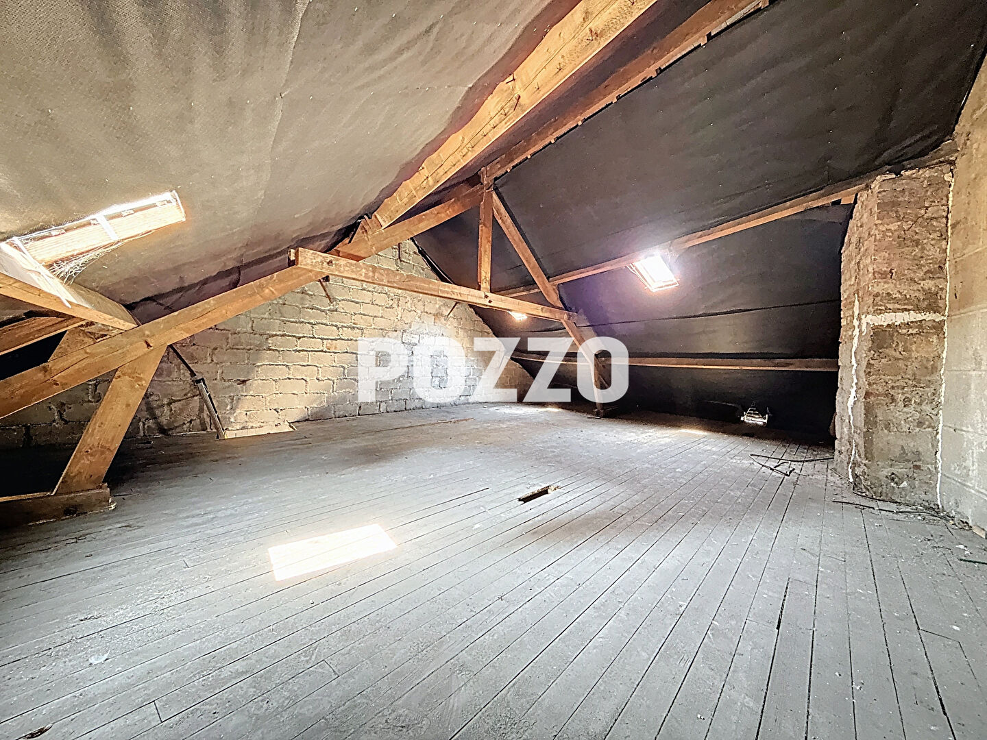 Photo GRANVILLE  : Un plateau à aménager et un garage quartier Saint Paul image 6/6