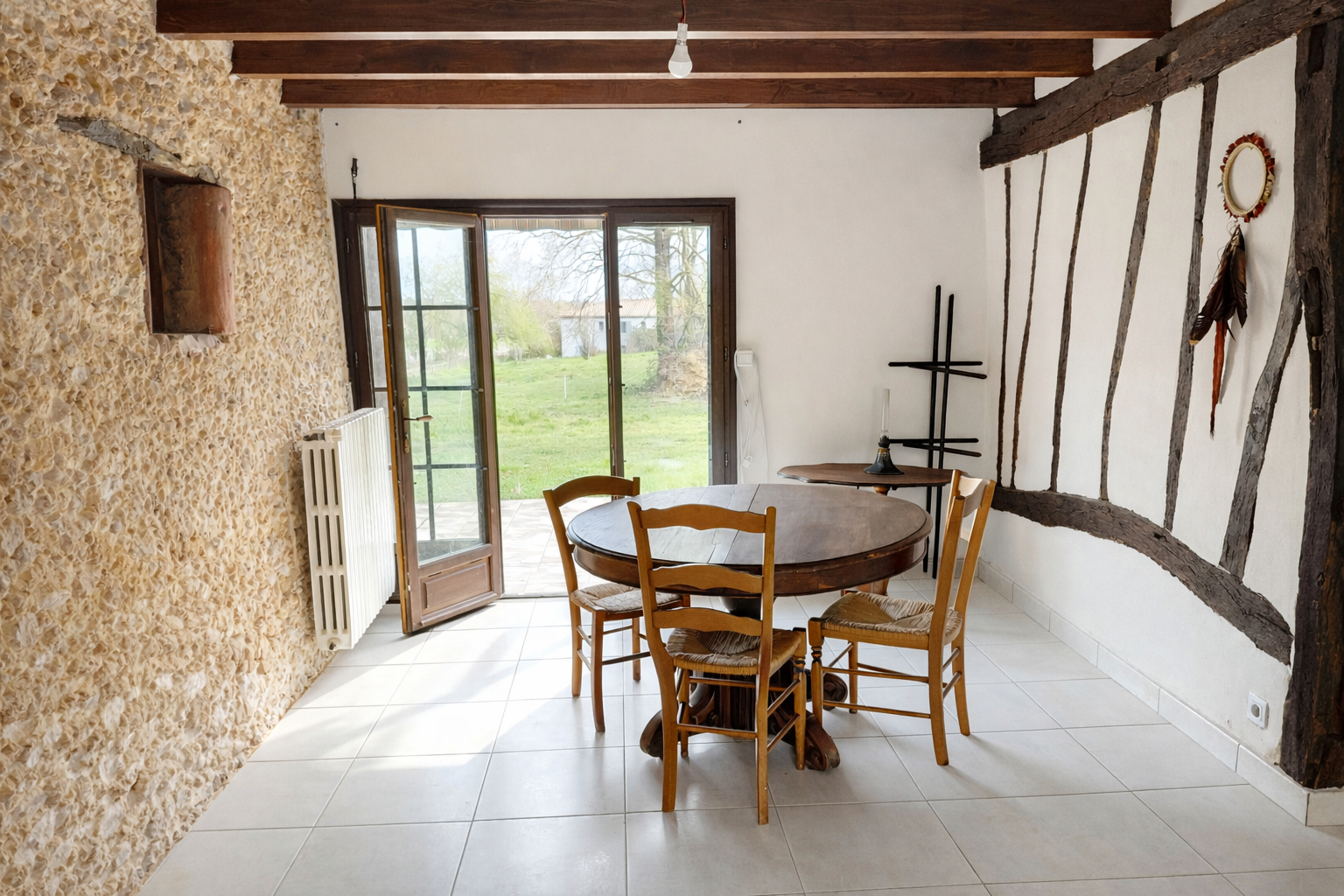 
Maison en colombage avec gîte attenant sur grand terrain arboré
 Photo du bien 4 