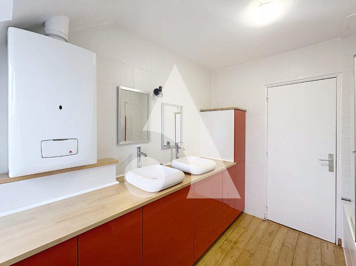 Photo Appartement de 83m2 en hyper-centre avec 1 place de parking couverte image 5/6