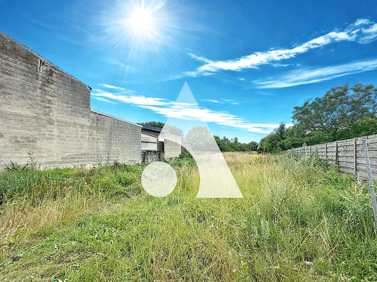 Terrain constructible avec Plain pied et garage à Raismes