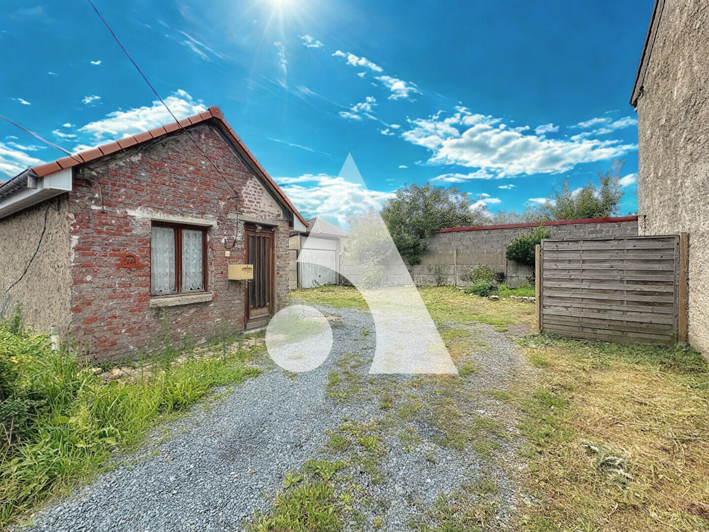 Photo Terrain constructible avec Plain pied et garage à Raismes image 3/4