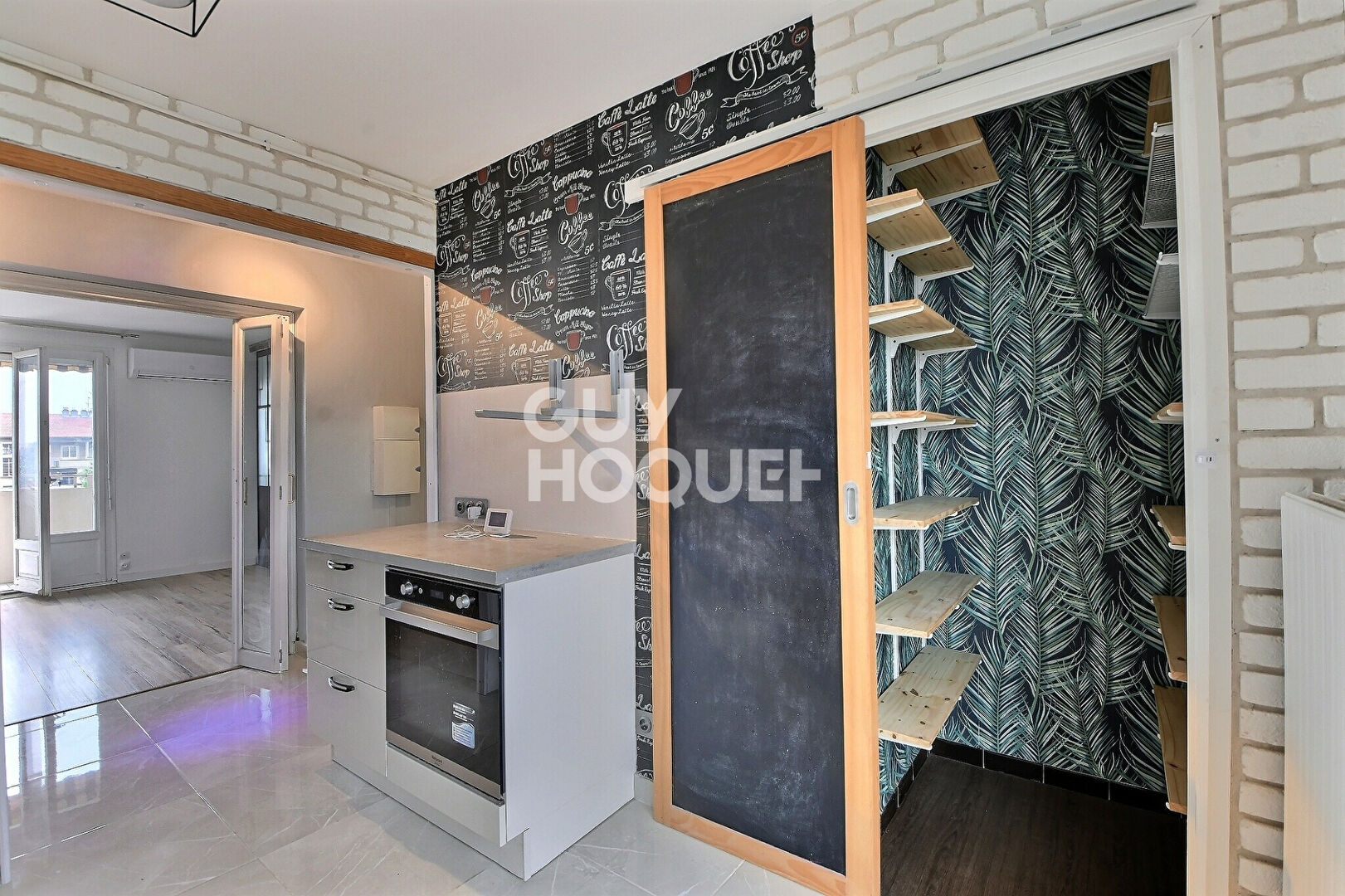 Appartement T4 de 73 m² avec balcon, parking et cave à Villeurbanne (69100).