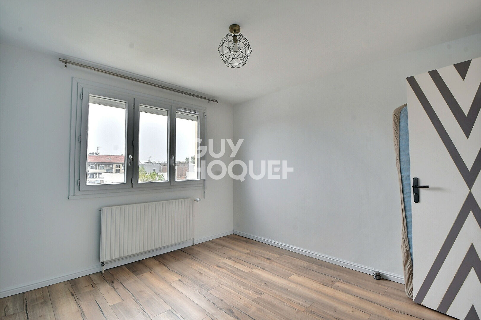 Appartement T4 de 73 m² avec balcon, parking et cave à Villeurbanne (69100).