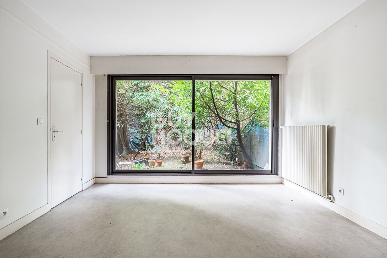 APPARTEMENT 2 PIECES AVEC JARDIN, PARKING ET CAVE