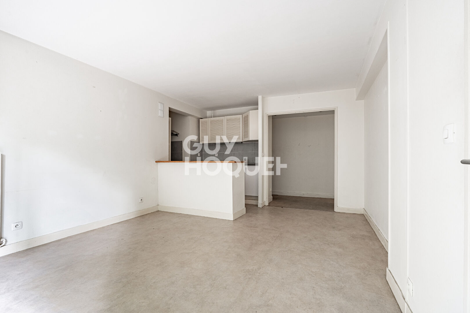 APPARTEMENT 2 PIECES AVEC JARDIN, PARKING ET CAVE