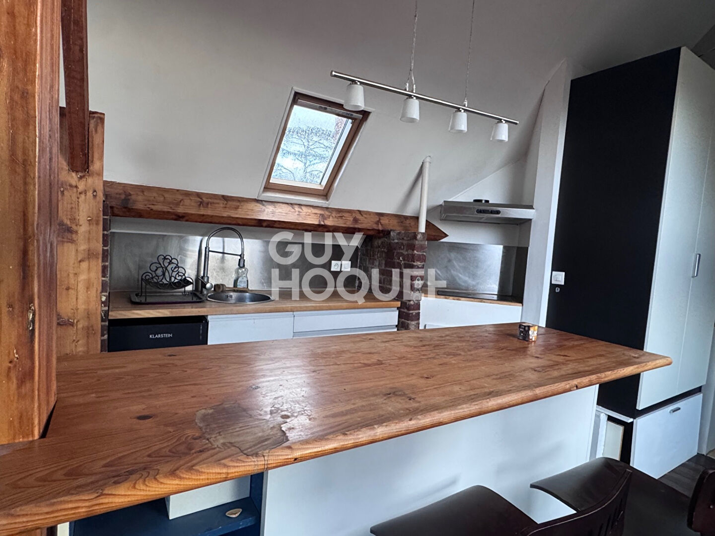 Spacieux meublé de 50m2 au sol avec place de parking