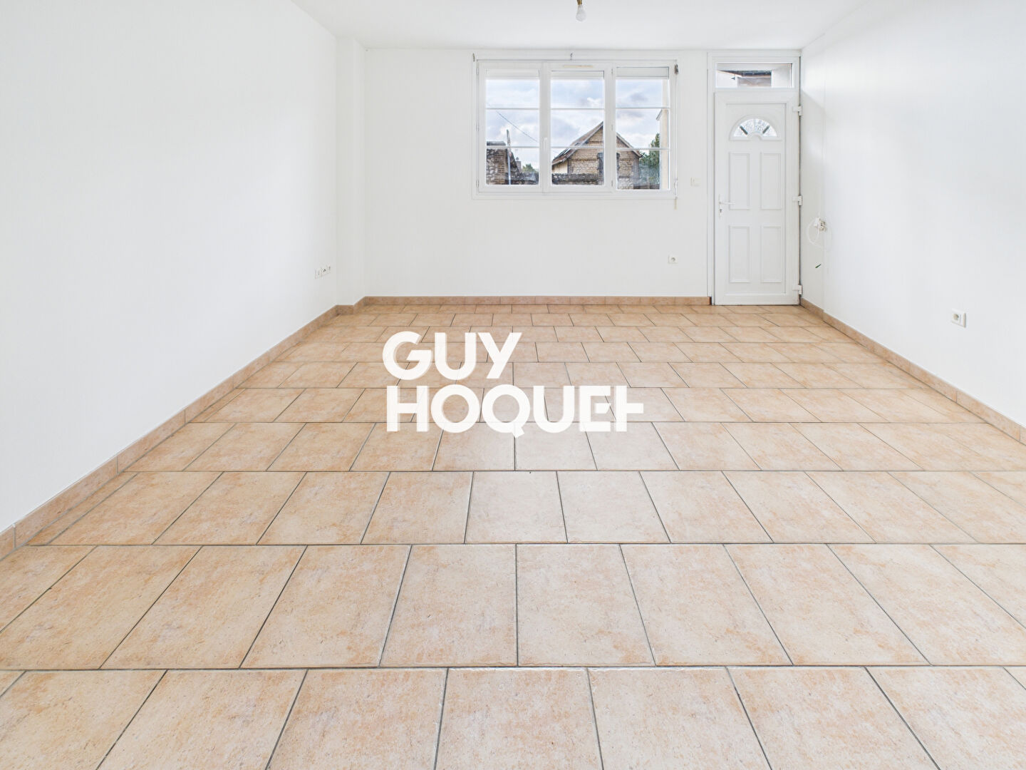 Maison T4 avec courette et garage à Oissel