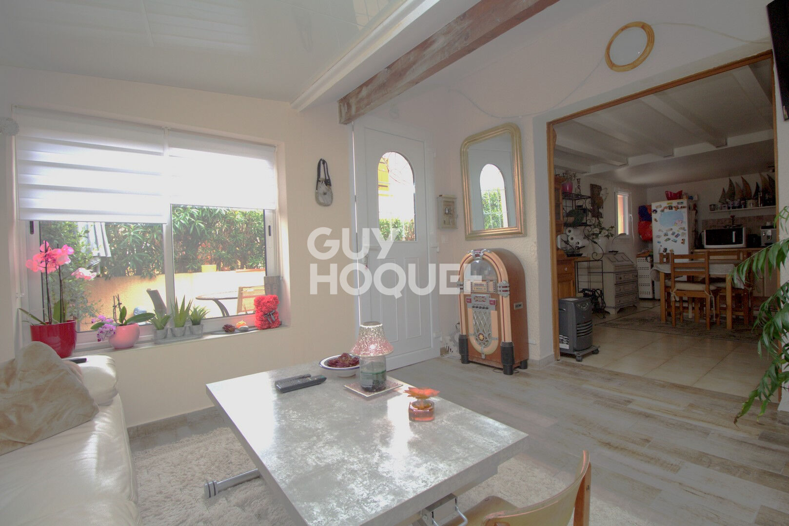 Maison T2 en copropriété  + véranda + parking privatif à acquérir en su