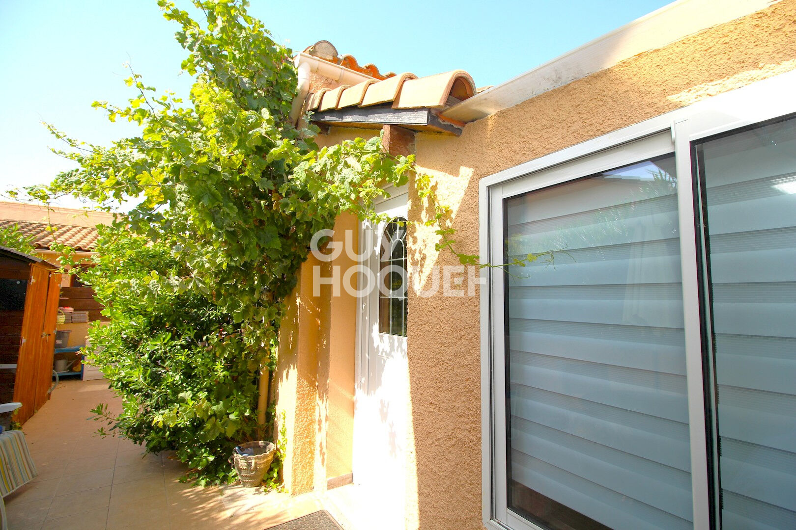 Maison T2 en copropriété  + véranda + parking privatif à acquérir en su