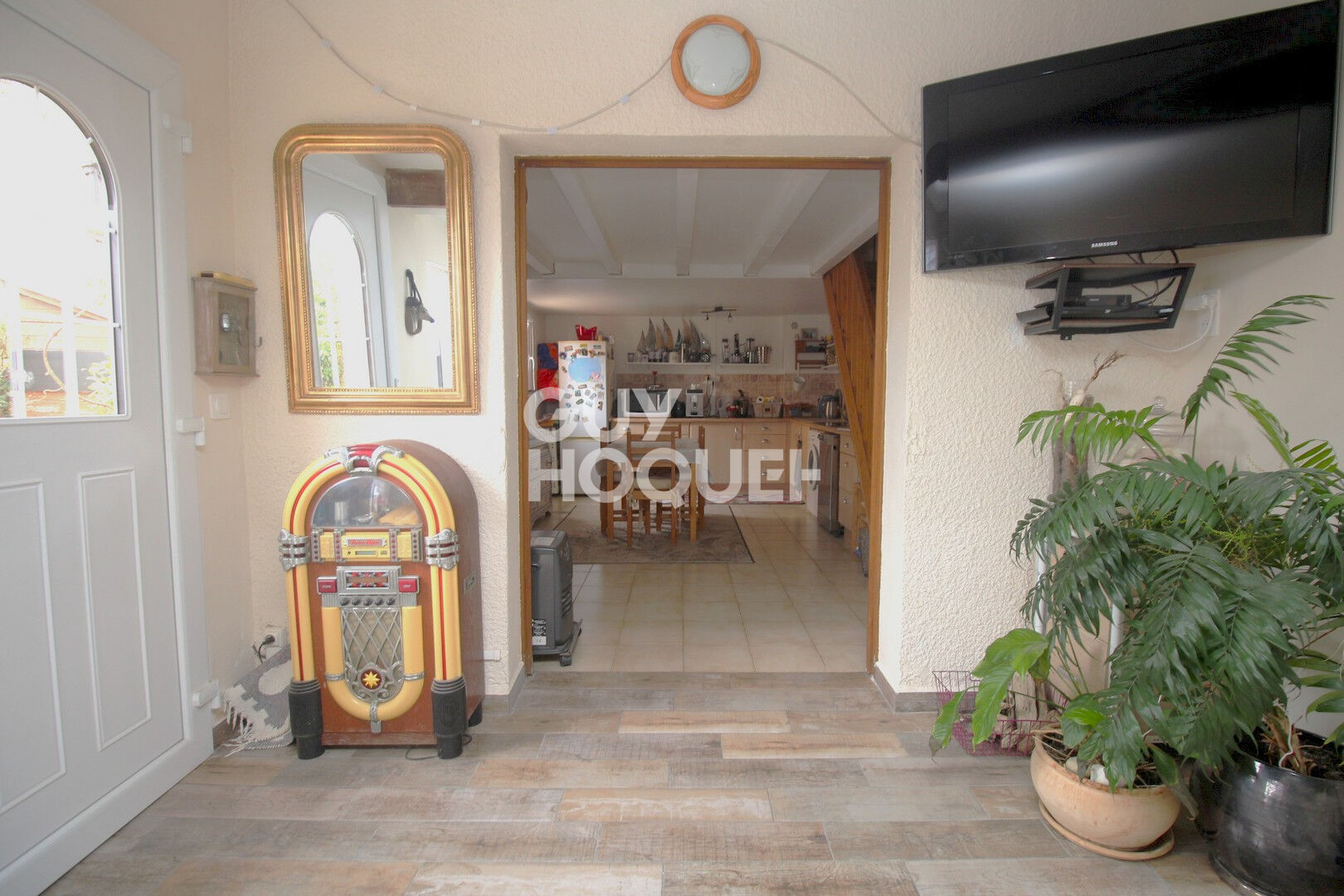 Maison T2 en copropriété  + véranda + parking privatif à acquérir en su