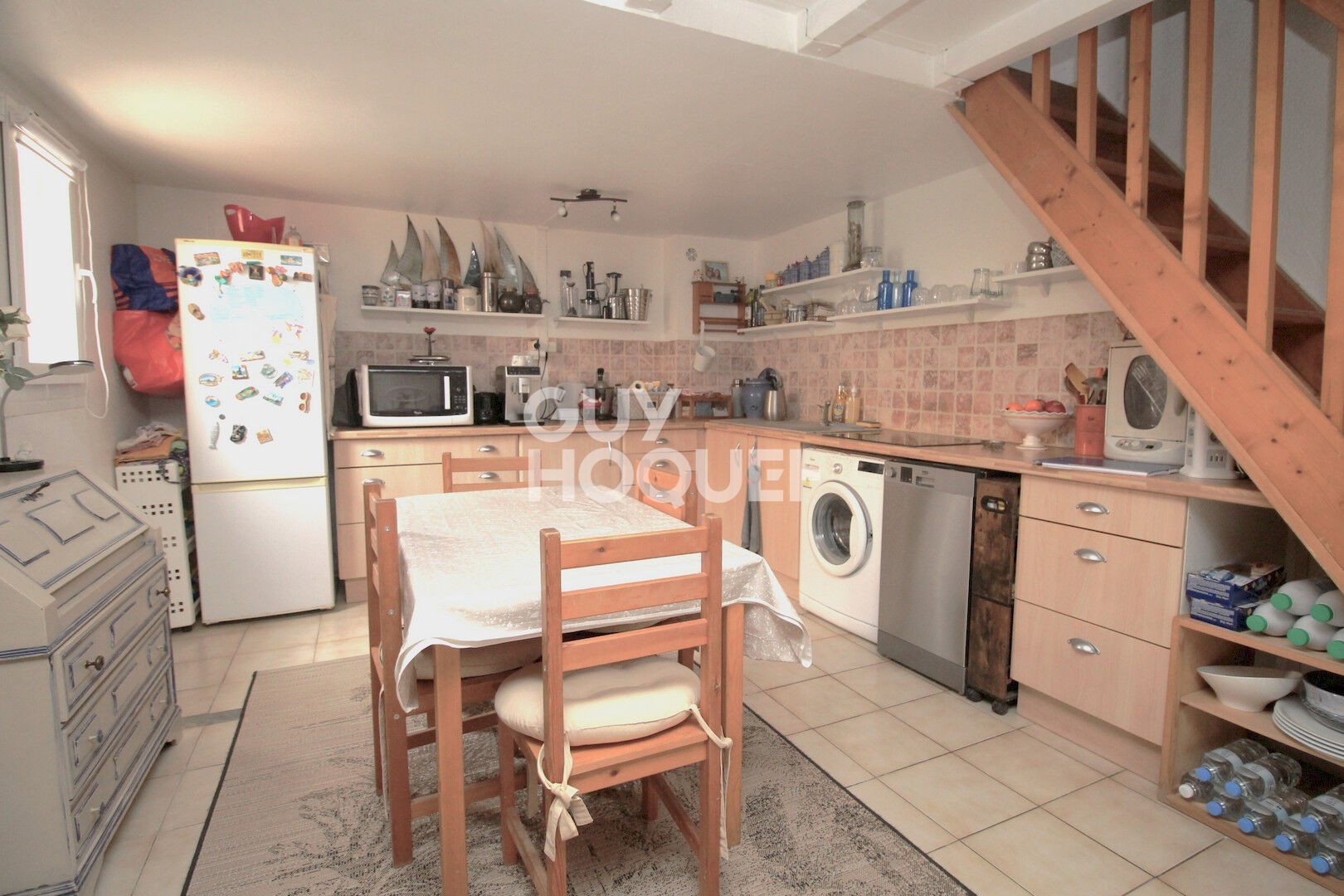 Maison T2 en copropriété  + véranda + parking privatif à acquérir en su