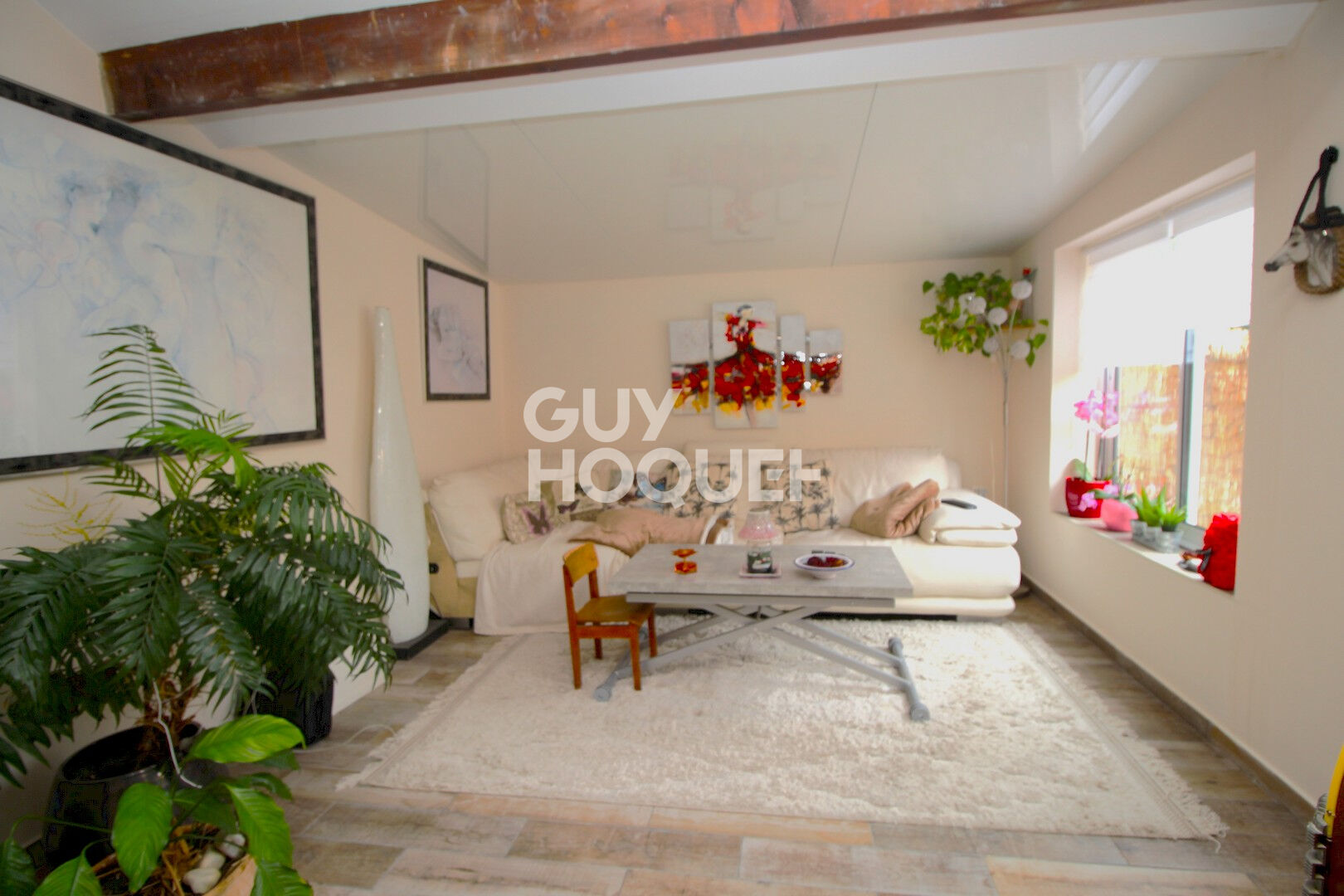 Maison T2 en copropriété  + véranda + parking privatif à acquérir en su