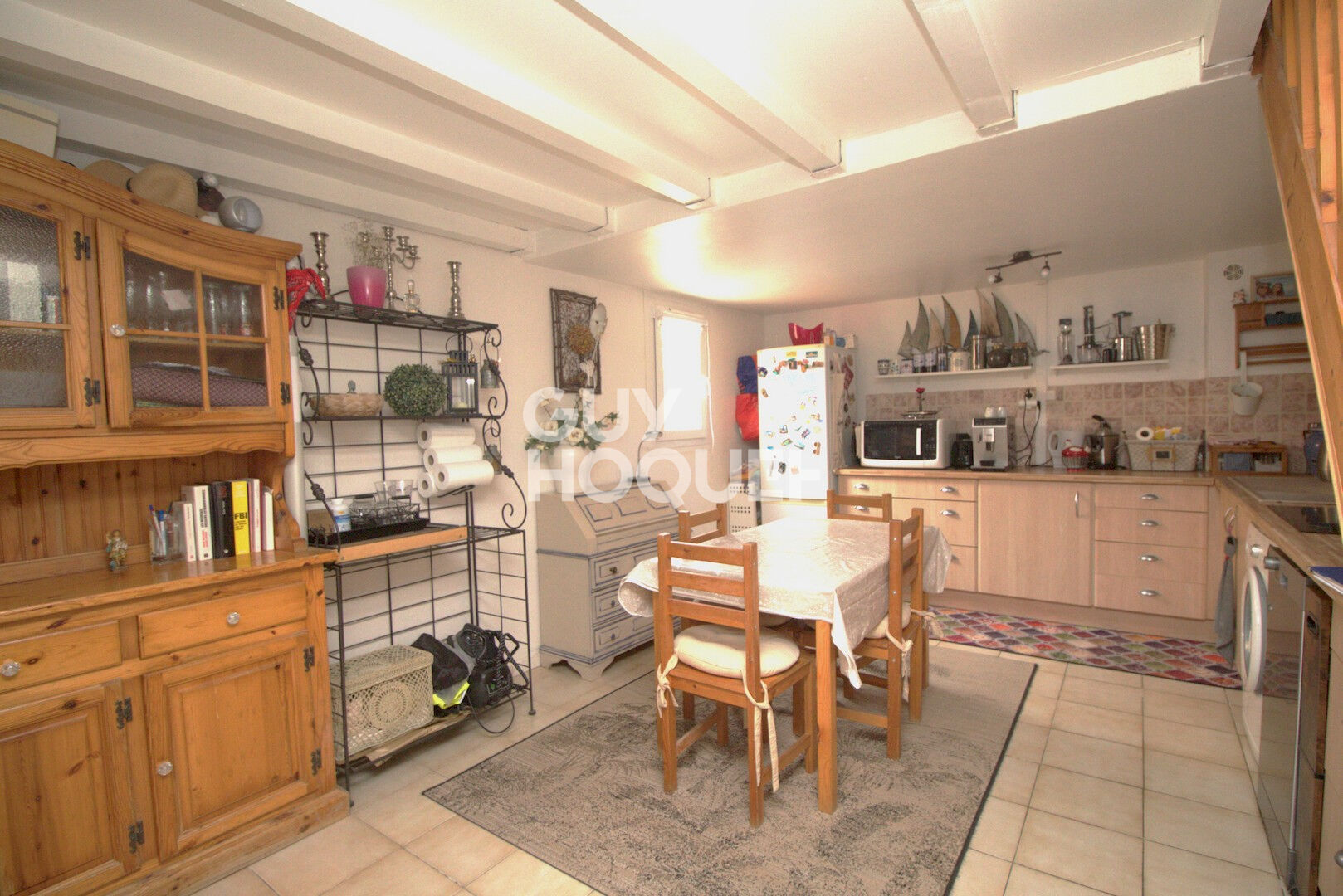 Maison T2 en copropriété  + véranda + parking privatif à acquérir en su