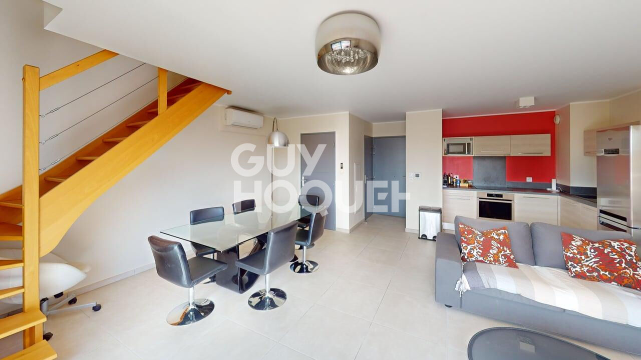 A VENDRE - CANET EN ROUSSILLON - Duplex de prestige 3 pièces avec vue panoramique, terrasses et garage.