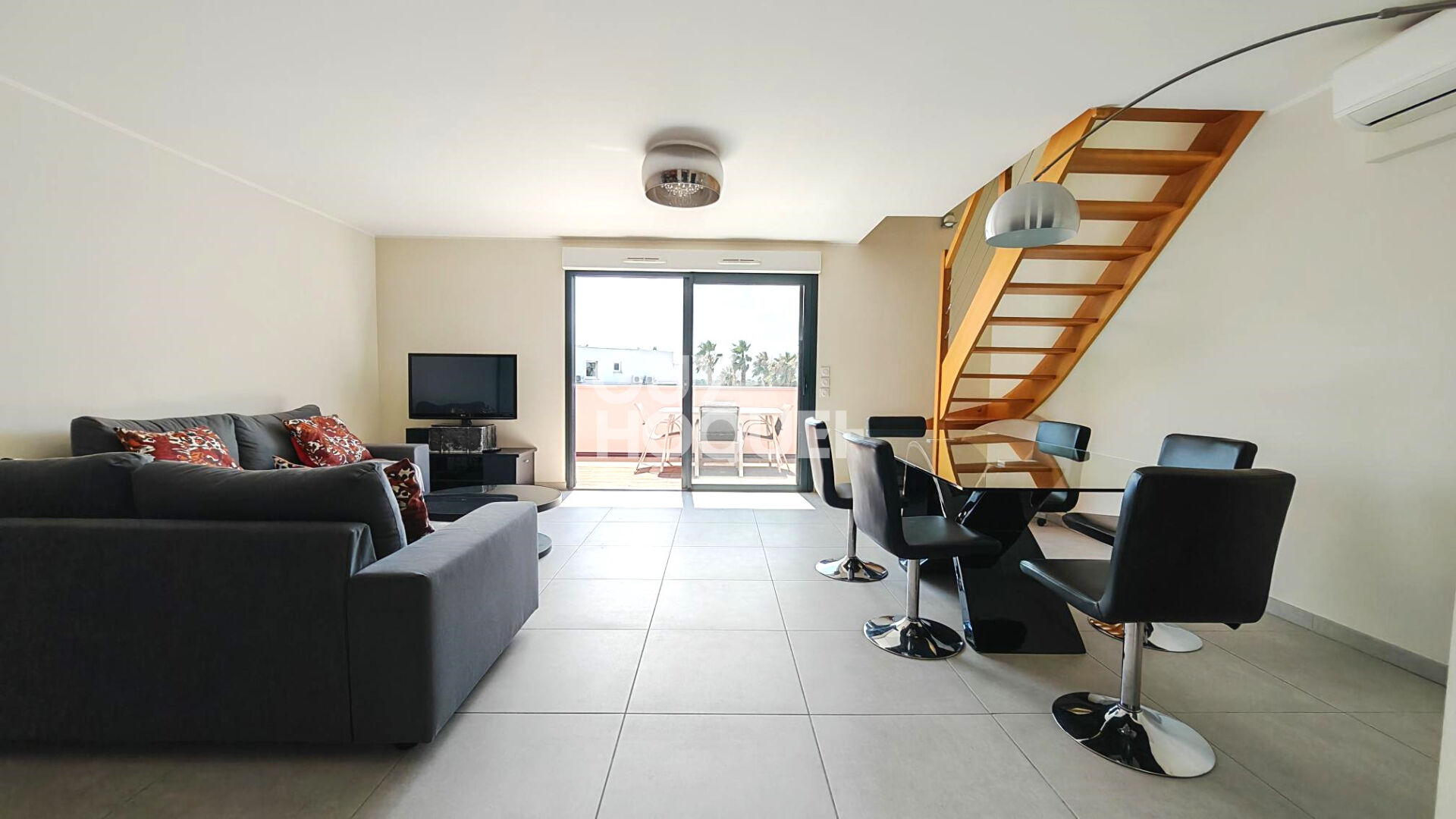 A VENDRE - CANET EN ROUSSILLON - Duplex de prestige 3 pièces avec vue panoramique, terrasses et garage.