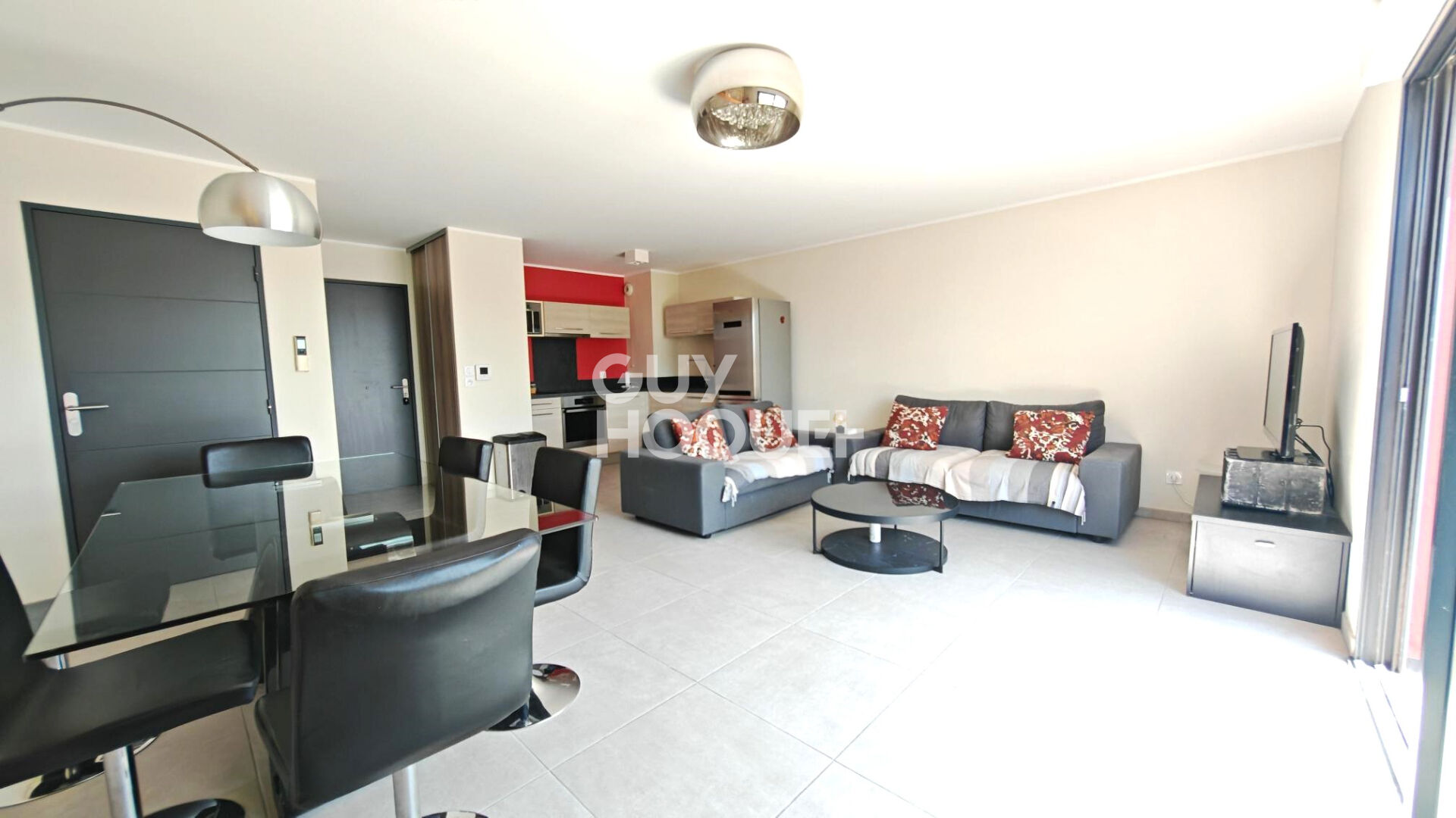 A VENDRE - CANET EN ROUSSILLON - Duplex de prestige 3 pièces avec vue panoramique, terrasses et garage.