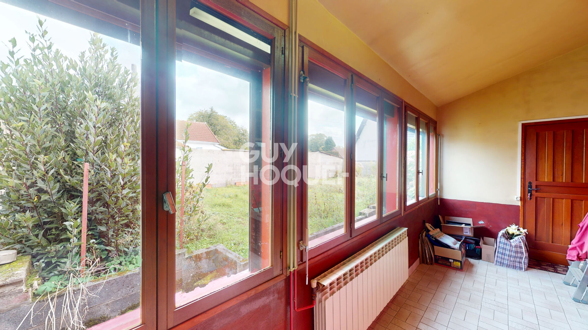 Maison de plain-pied à vendre à PÉRONNE (80200) avec garage et véranda.