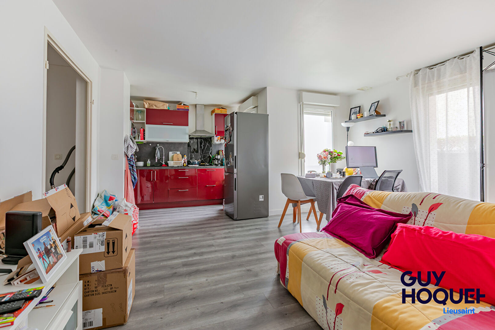 Appartement 3 pièces de 56 m² , terrasse, box et place de parking à vendre à LIEUSAINT (77127).