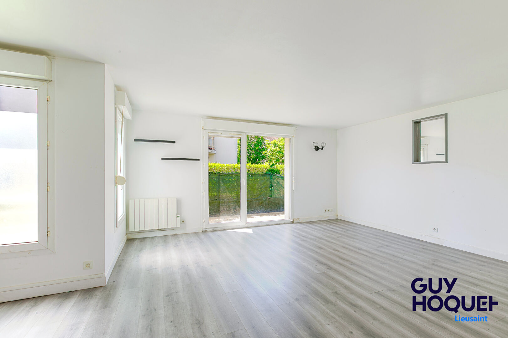Appartement 3 pièces de 56 m² , terrasse, box et place de parking à vendre à LIEUSAINT (77127).