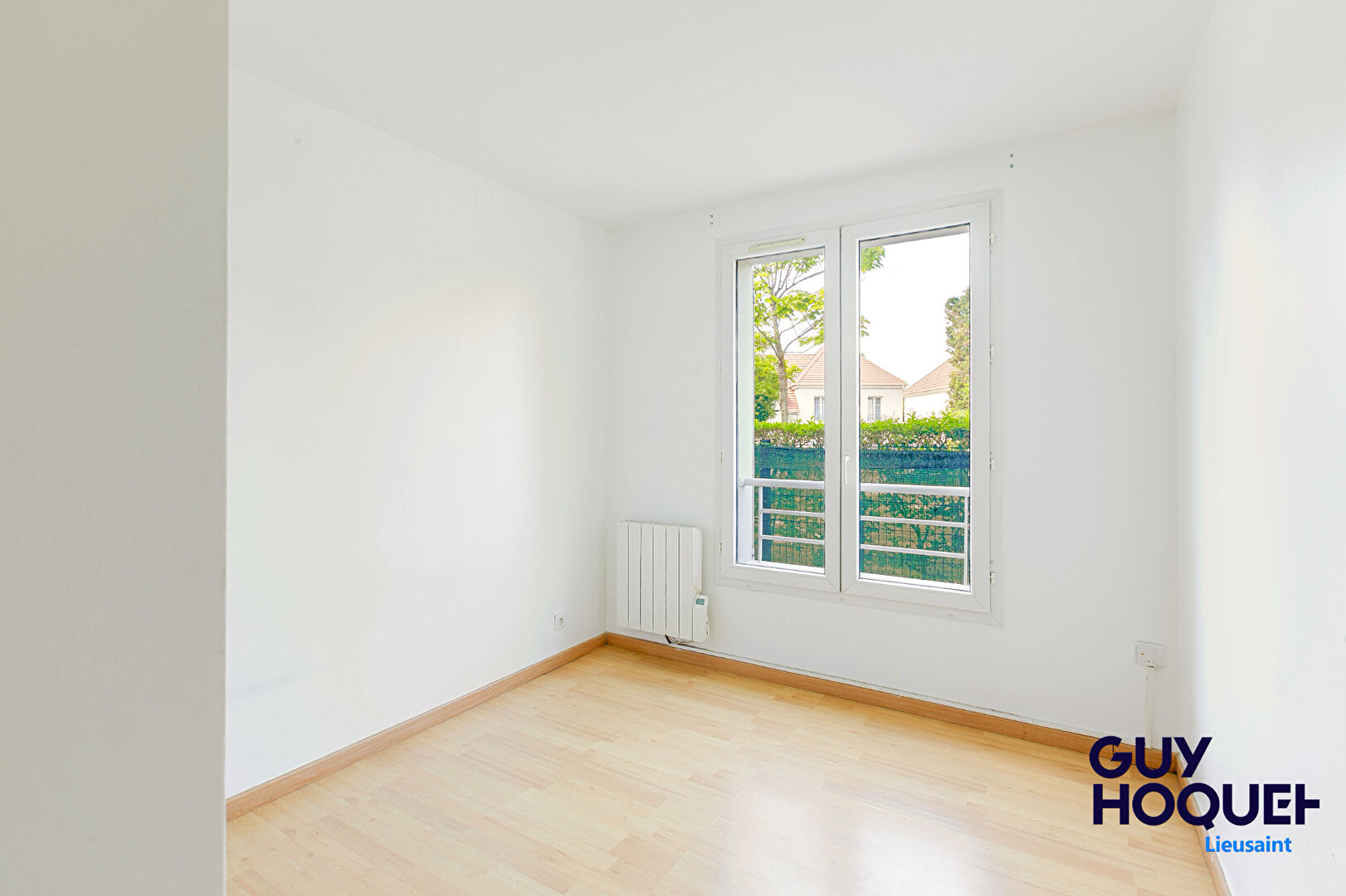 Appartement 3 pièces de 56 m² , terrasse, box et place de parking à vendre à LIEUSAINT (77127).