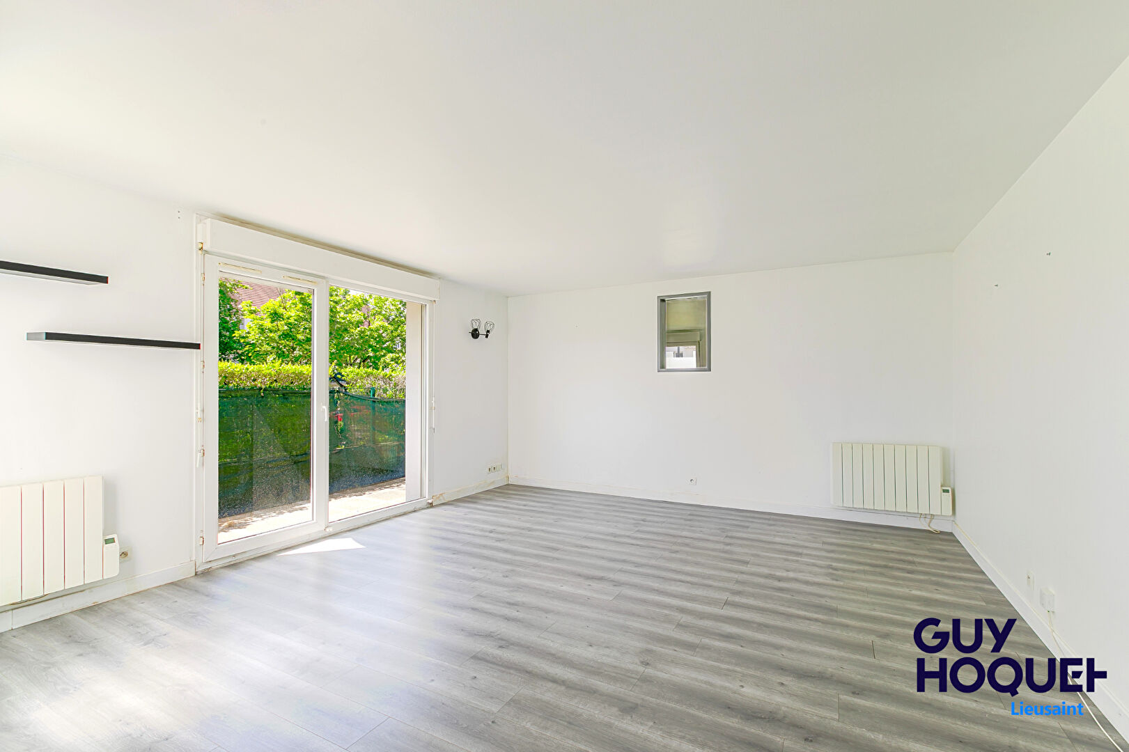 Appartement 3 pièces de 56 m² , terrasse, box et place de parking à vendre à LIEUSAINT (77127).