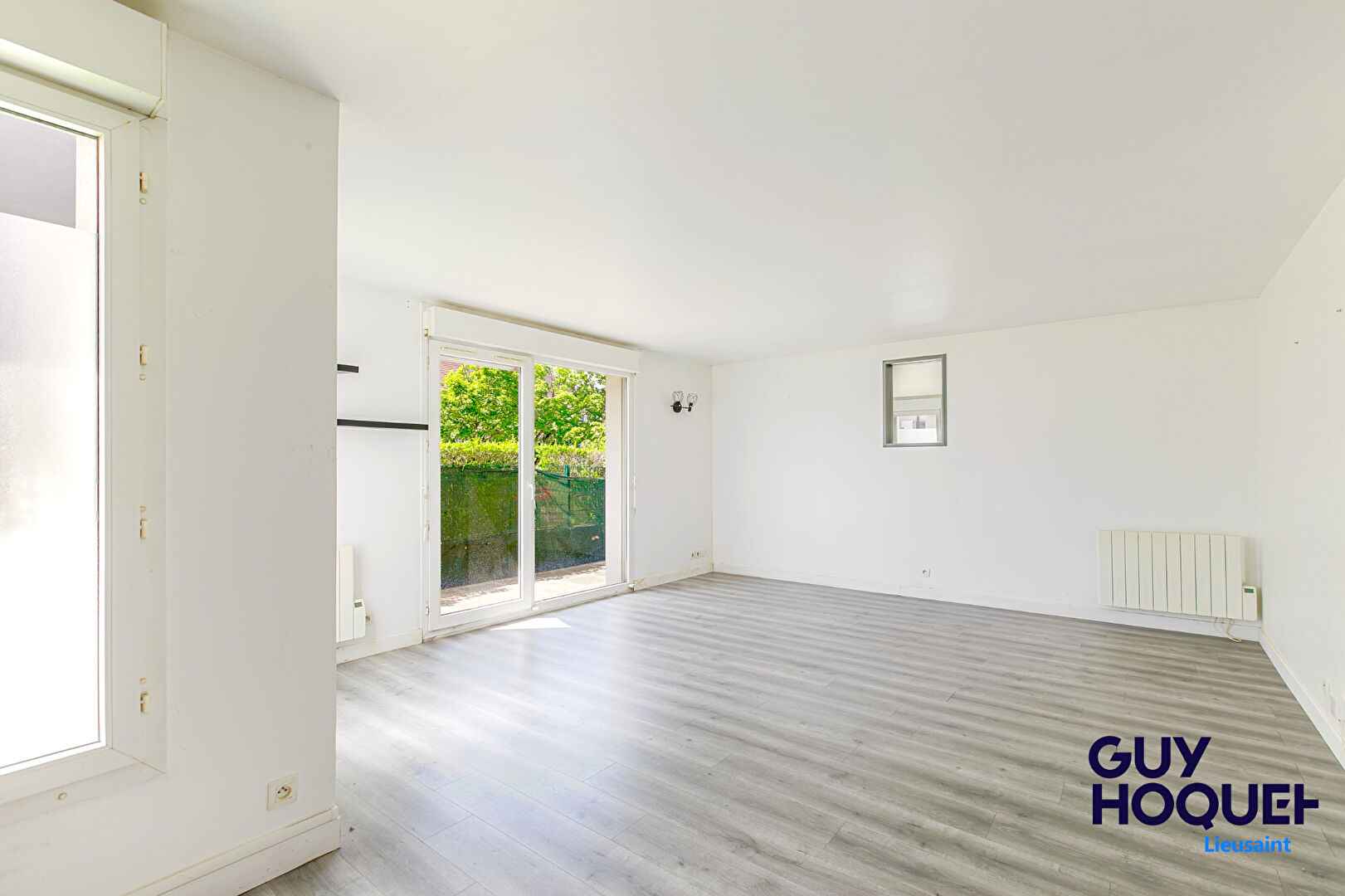 Appartement 3 pièces de 56 m² , terrasse, box et place de parking à vendre à LIEUSAINT (77127).