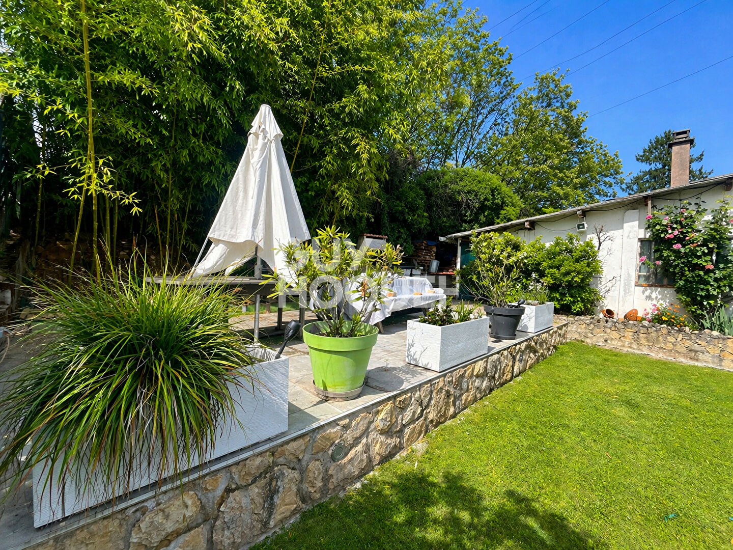 Appartement en rez de jardin avec exceptionnel jardin privatif à La Boisse