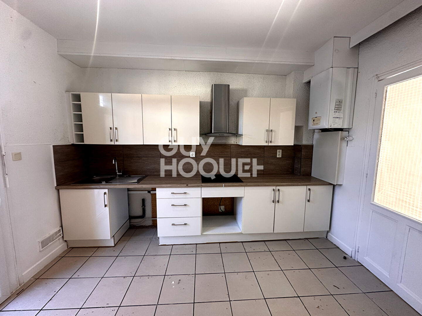 EXCLUSIVITE - A vendre à Perpignan (66000) Quartier Saint-Martin Appartement F5 - 100 m²  - 1er étage - 2 terrasses et caves.