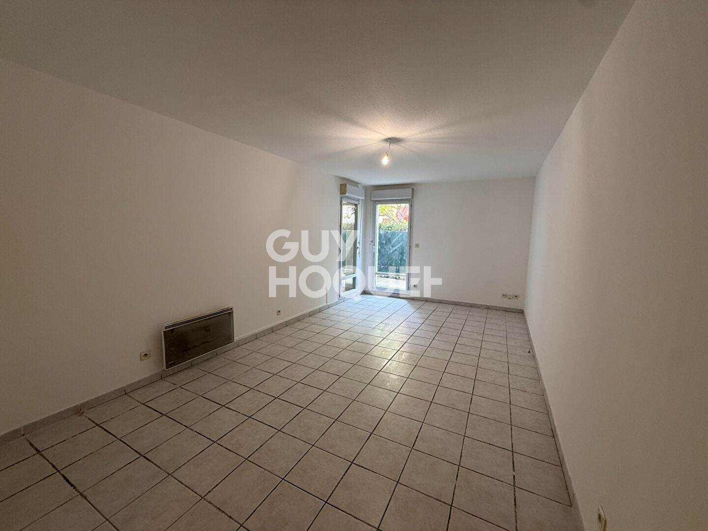 Appartement F2, 43 m² en rez-de-chaussée avec terrasse et parking, à vendre à PERPIGNAN, quartier Saint Martin