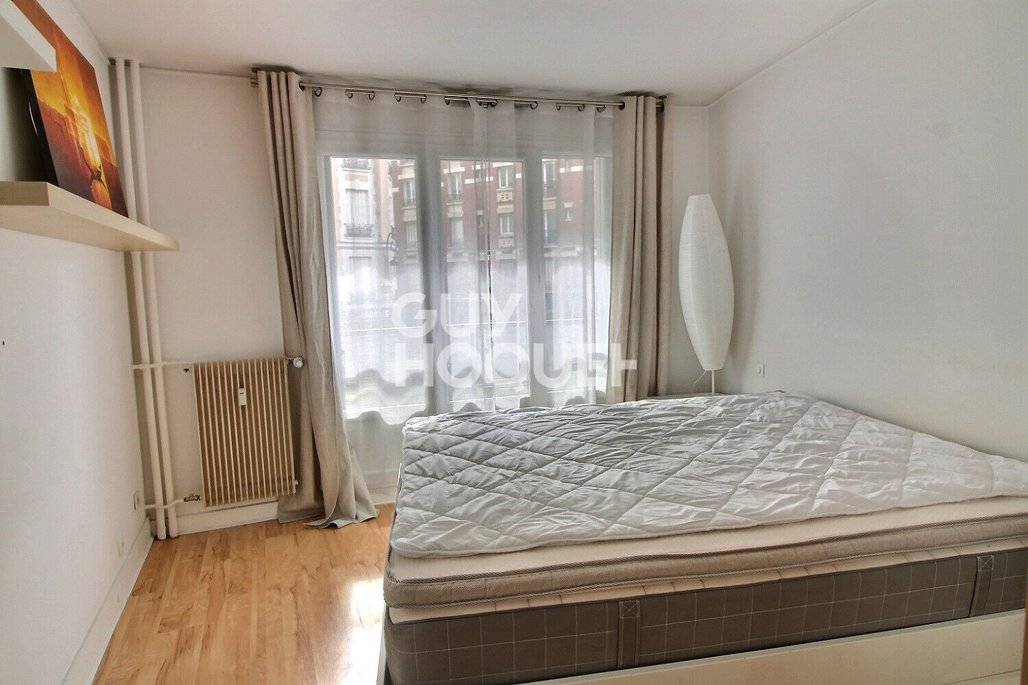 Duplex 3 pièces en rez-de-jardin à vendre à Puteaux centre ville - Exclusivité Guy Hoquet