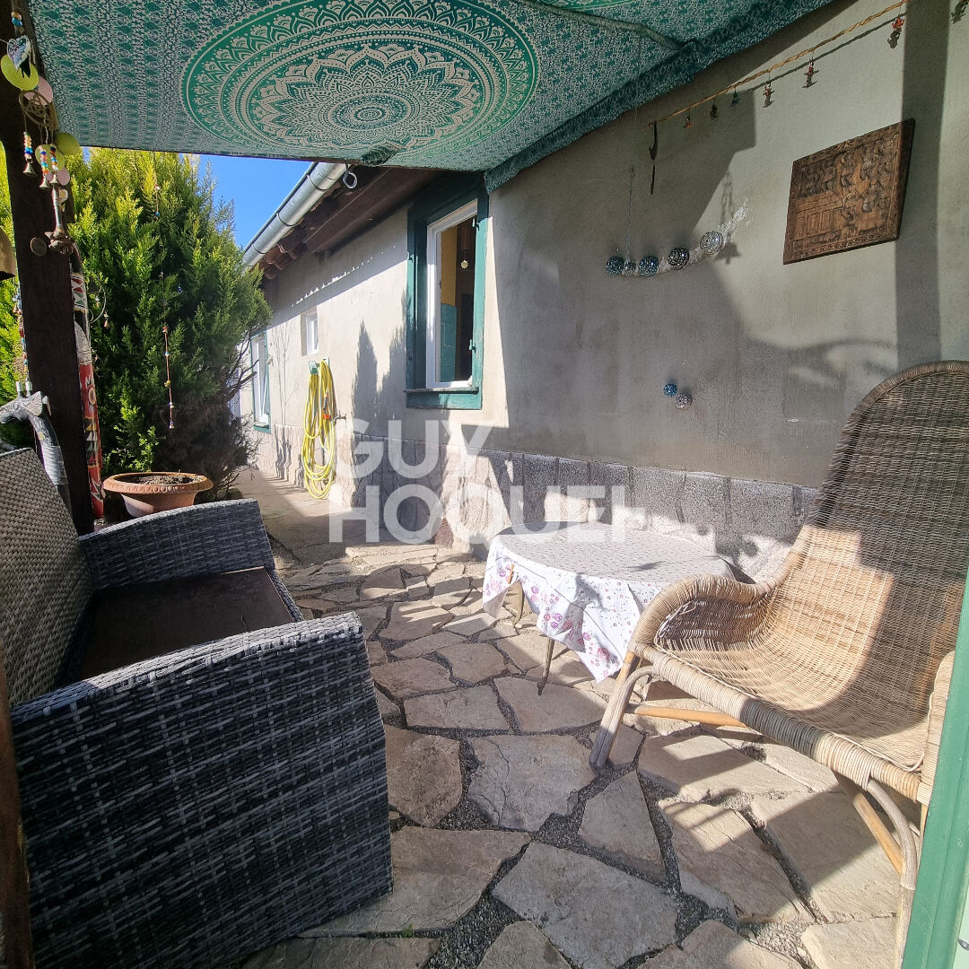 Maison individuelle de plain-pied 3 pièces 71 m² habitables sur grand terrain de 15,15 ares