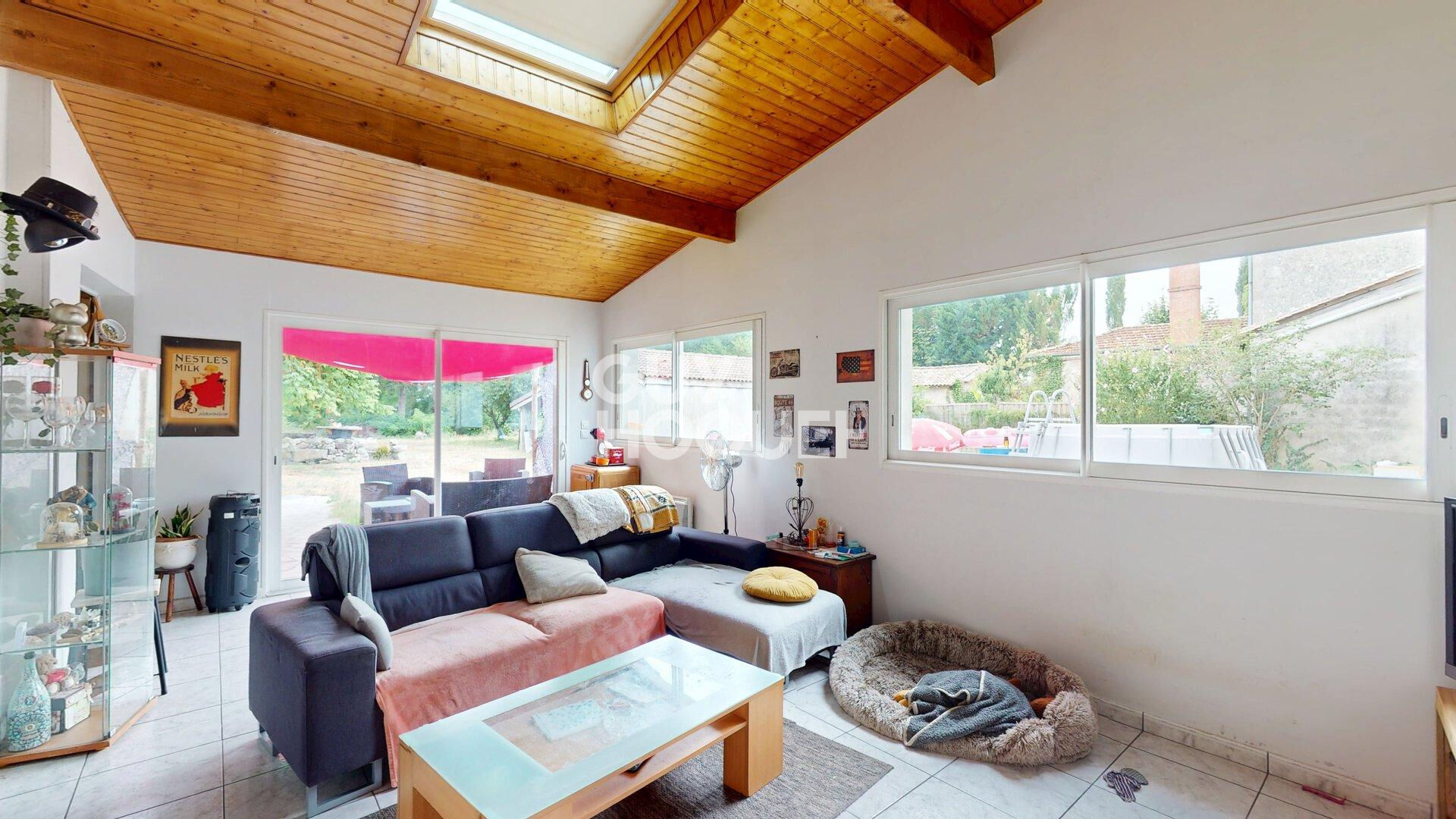 Maison - garage - grand jardin