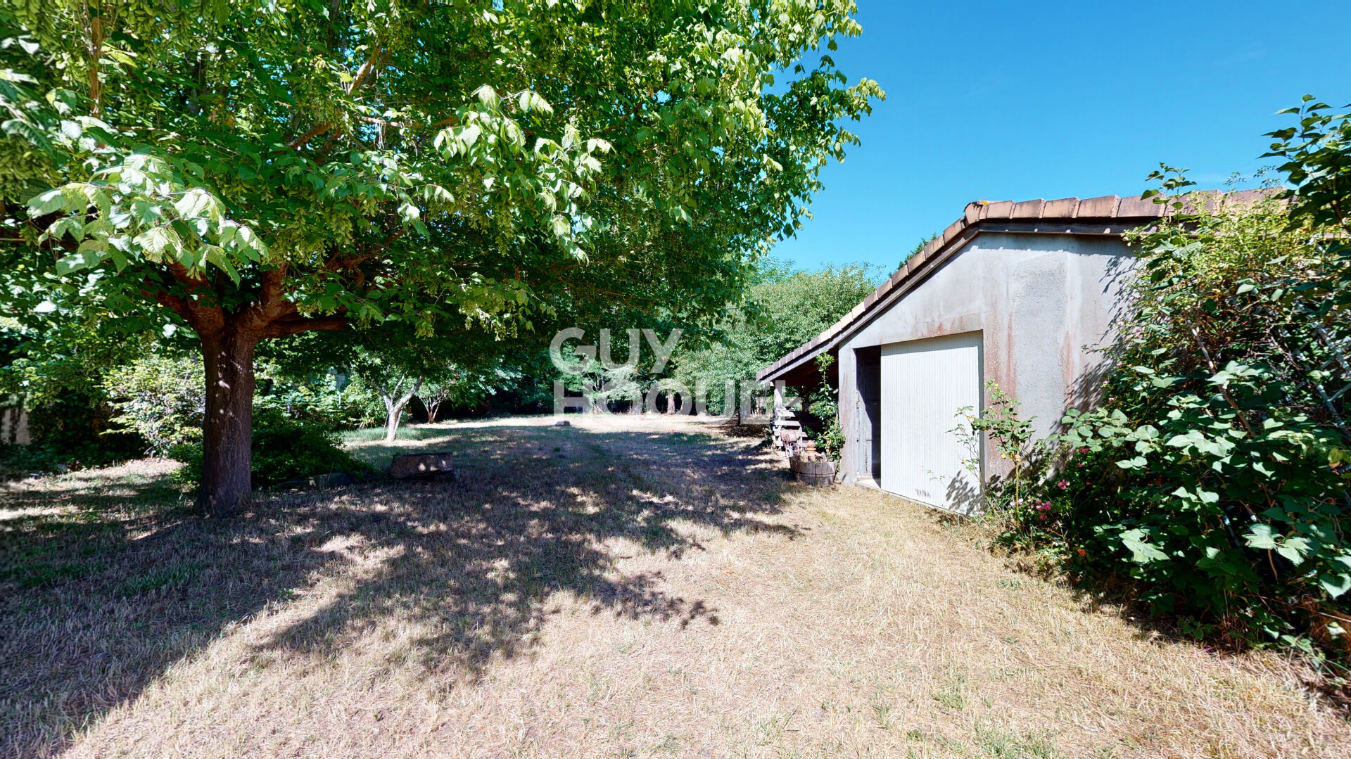 Maison - garage - grand jardin