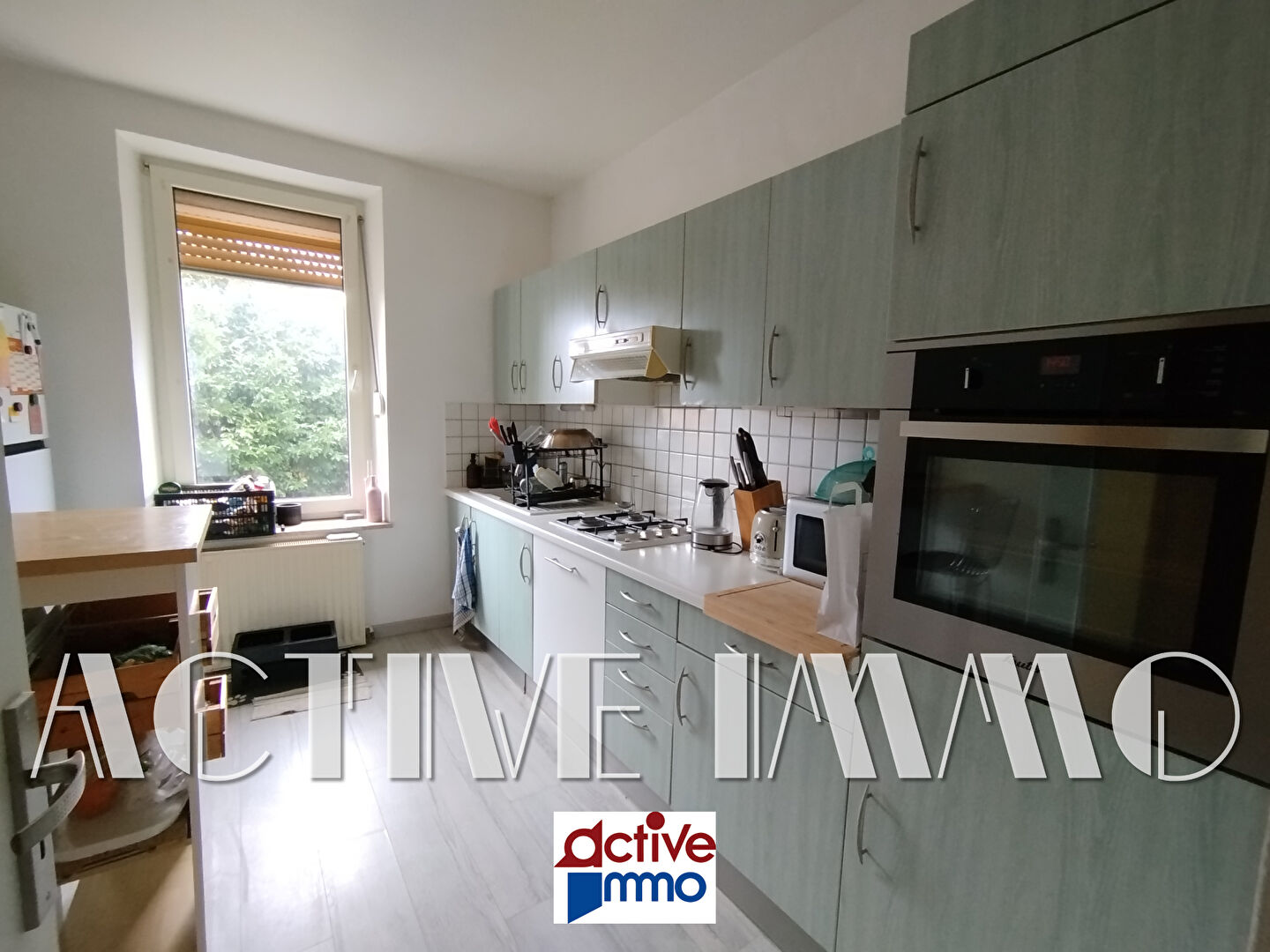 Photo Immeuble de rapport - 3 appartements + garage image 2/6