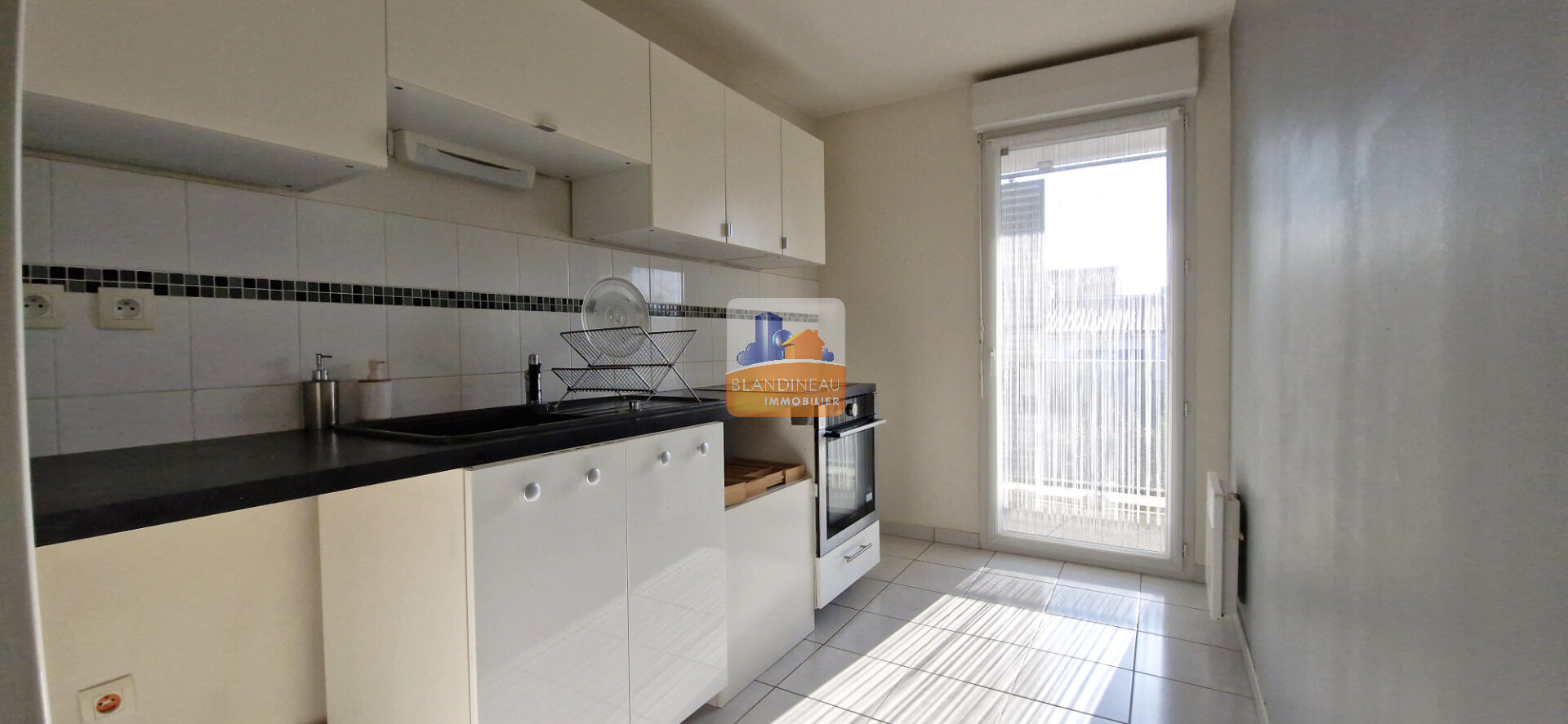 Photo APPARTEMENT 59M² BOUGUENAIS BOURG 2CH AVEC TERRASSE, GARAGE ET PARKING image 4/6