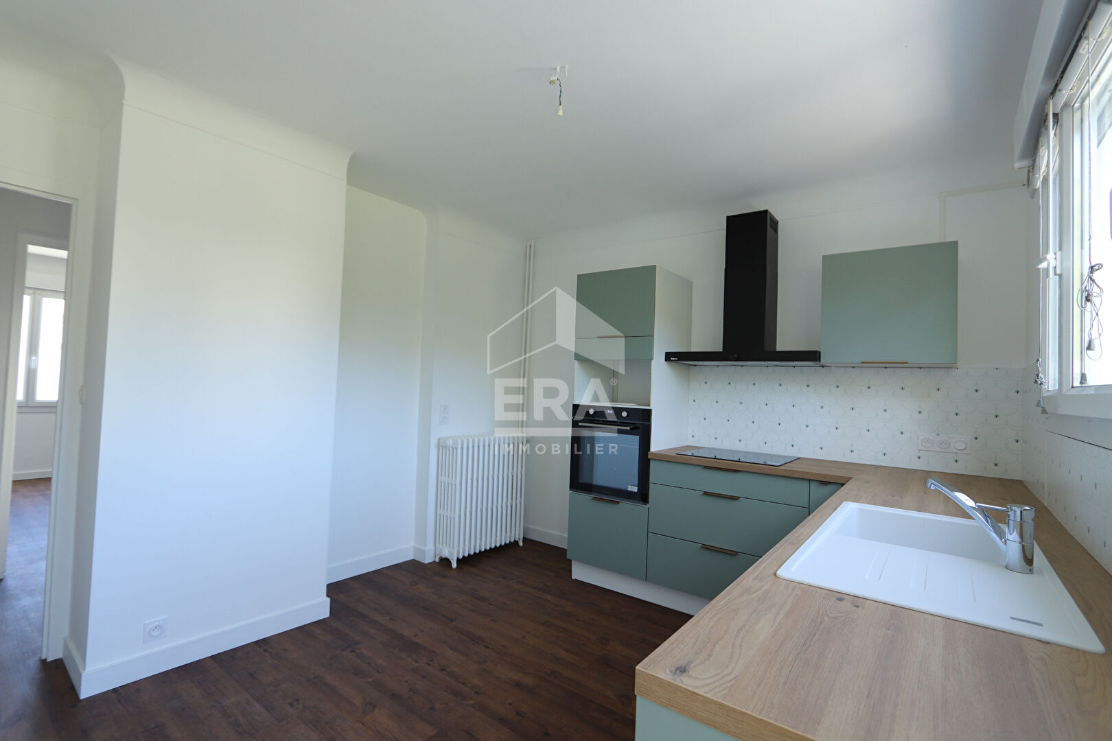 Photo À louer - Maison familiale de 90 m² avec jardin et garage - Quartier Dunois, Orléans image 5/6