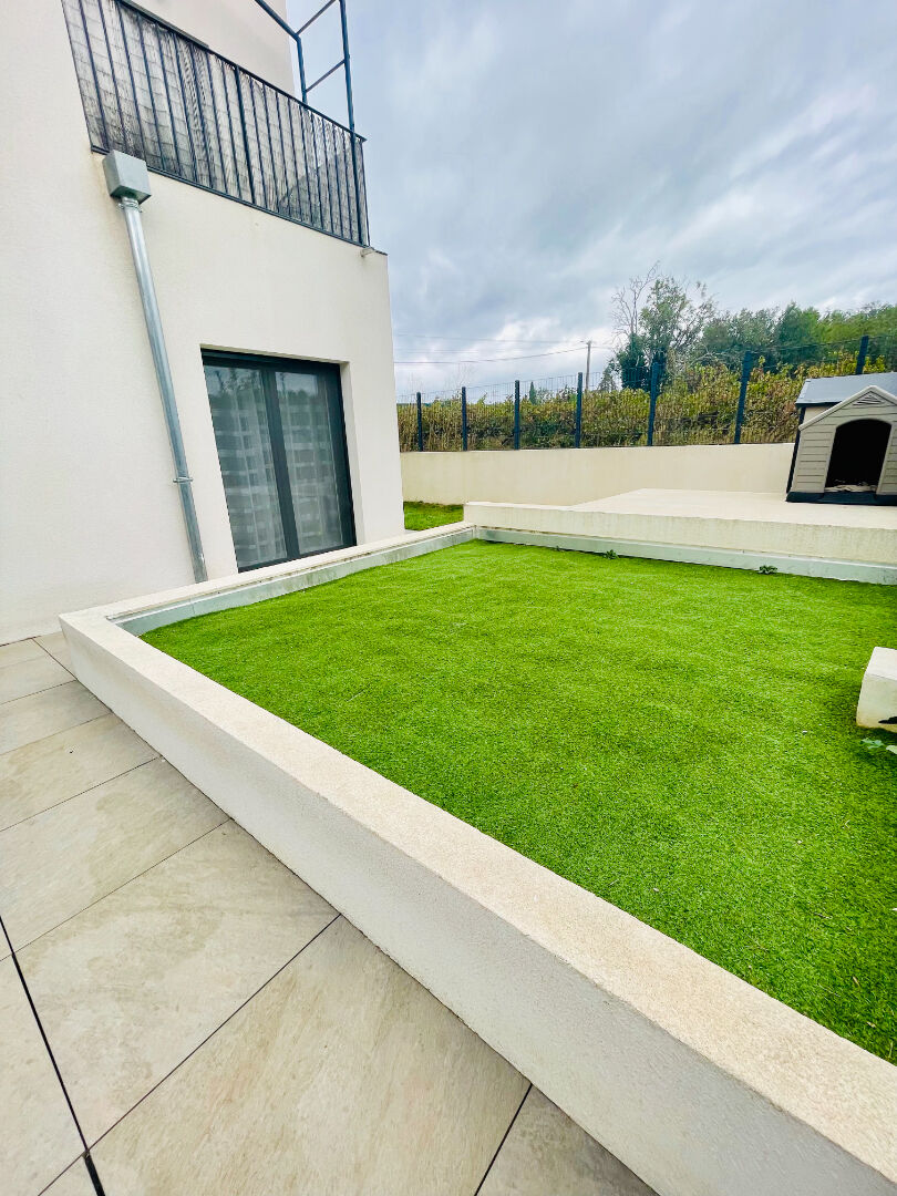 Appartement de type 3  avec terrasse et jardin