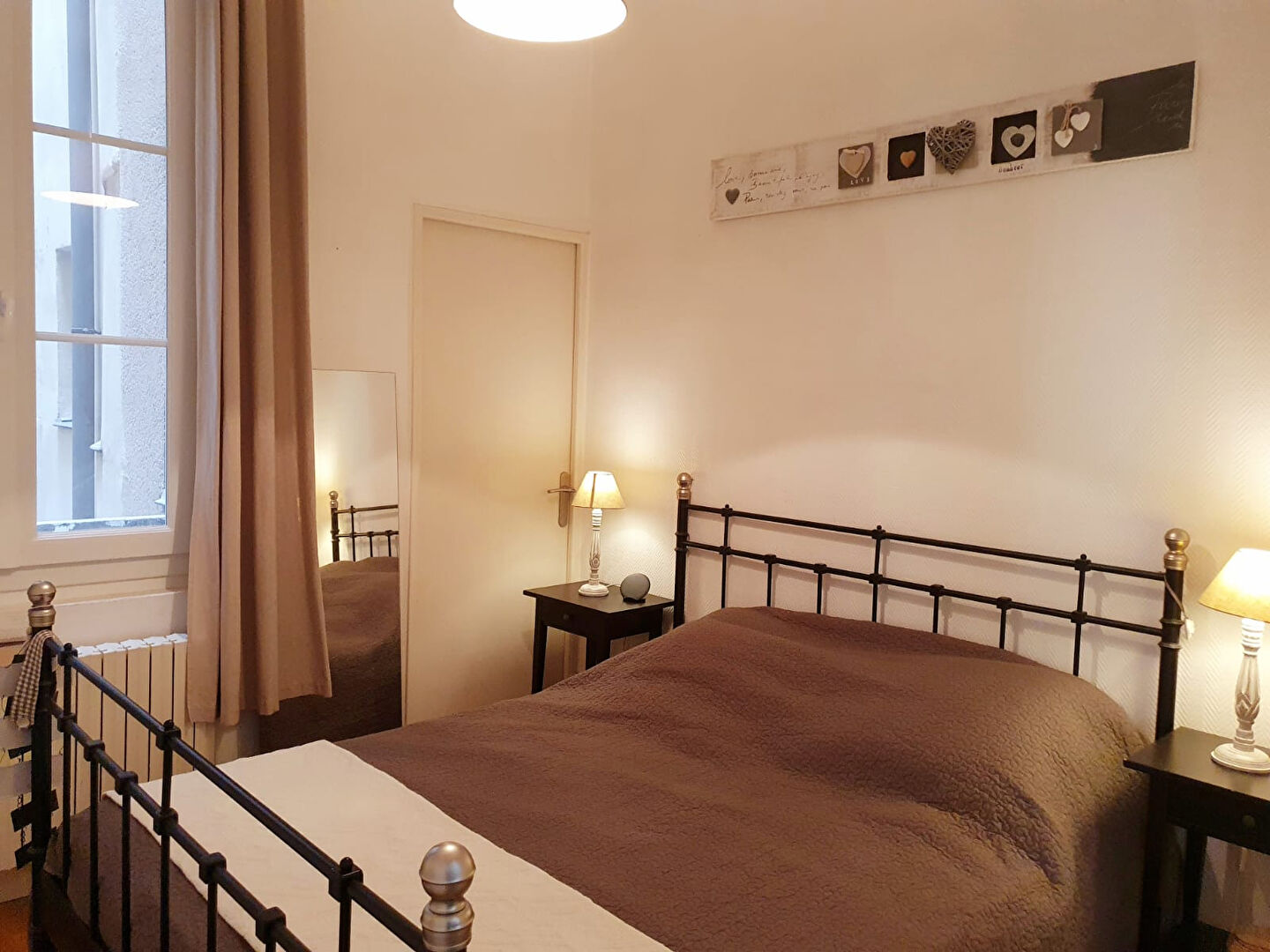 Photo Centre Ville - Dans un immeuble Haussmannien, au deuxième étage avec ascenseur, bel appartement comprenant un double salon-séjour et deux chambres. Cave image 6/6