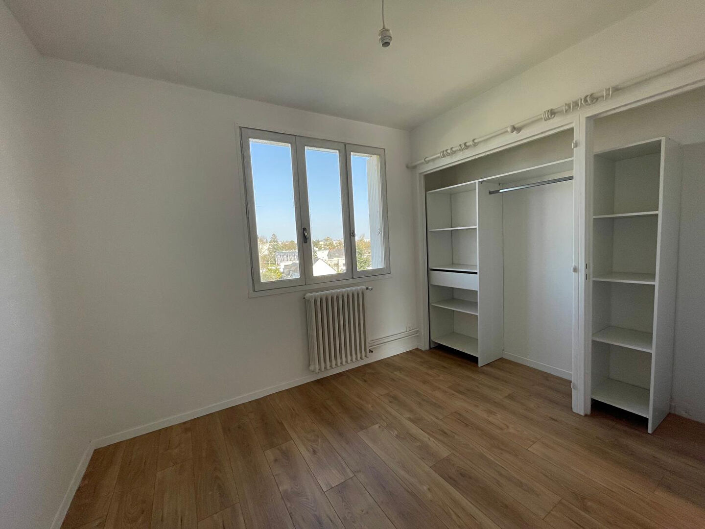 Photo Marrière - bel appartement deux pièces spacieux et lumineux. Balcon, pkg et cave. Possibilité d'améliorer le DPE facilement en D. image 4/5