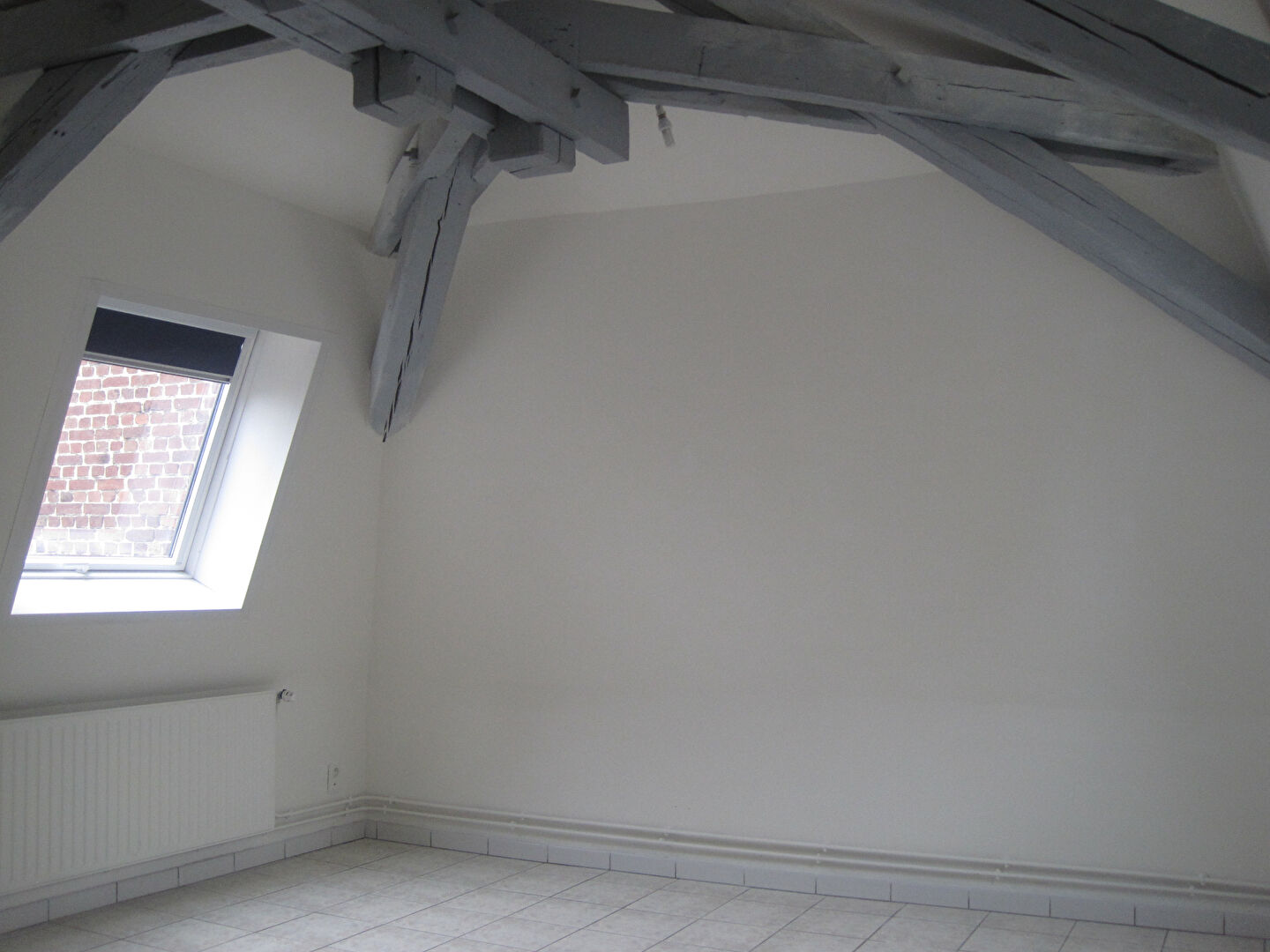 Photo A LOUER APPARTEMENT PROCHE CENTRE VILLE  ET GARE ST QUENTIN 02100 image 2/6