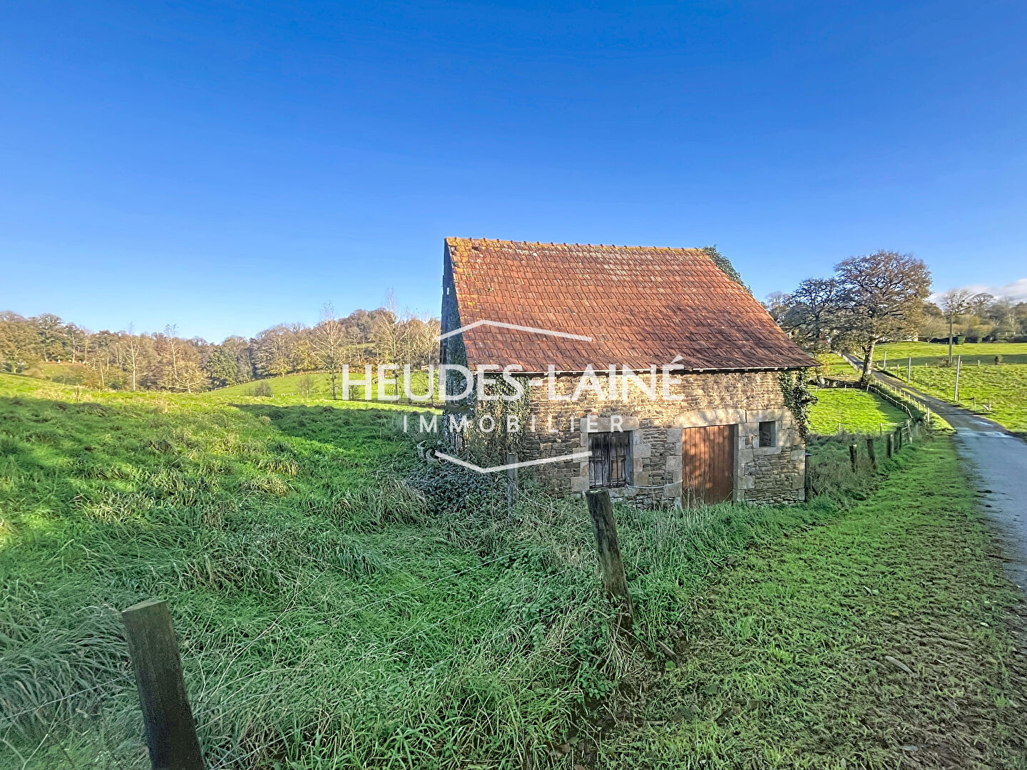 Photo Terrain Saint Jean De La Haize 14023 m2 image 2/3