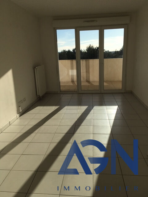 Photo À VENDRE : APPARTEMMENT T2 41,10m² AVEC TERRASSE ET PARKING SÉCURISÉE À JUVIGNAC image 2/6
