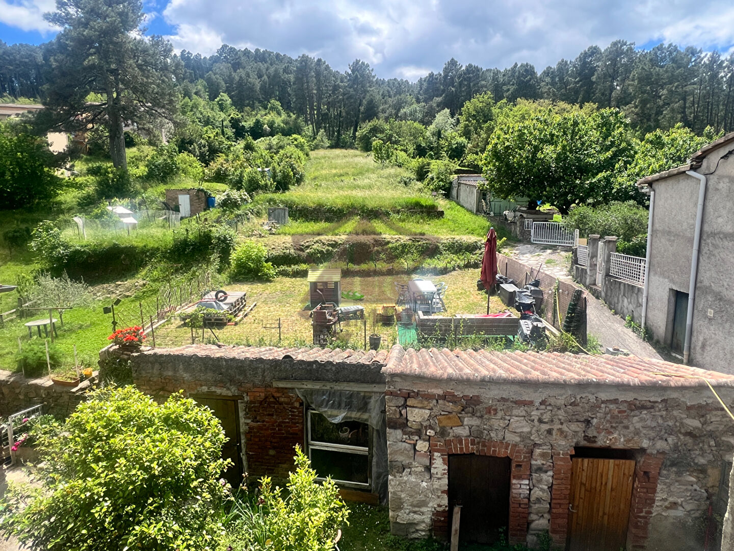 Photo Ensemble immobilier avec terrain image 4/6